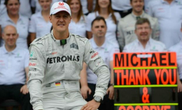 German Formula One driver Michael Schumacher poses with the Mercedes team in the pits at the Interlagos speedway in Sao Paulo, Brazil - AFP/File photo German Formula One driver Michael Schumacher poses with the Mercedes team in the pits at the Interlagos speedway in Sao Paulo, Brazil - AFP/File photo